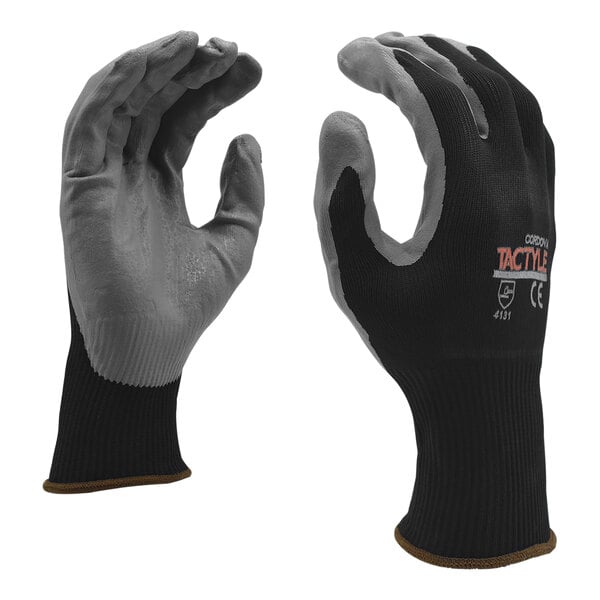 A pair of black Cordova warehouse gloves with gray foam palm coating.