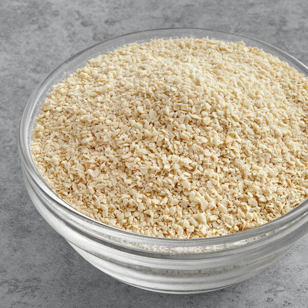 A bowl of Golden Dipt medium grind cracker bread crumbs.