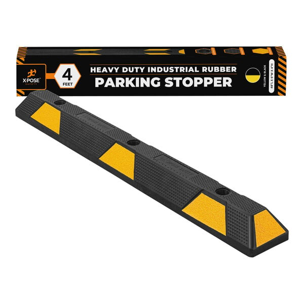 A yellow and black heavy-duty rubber Xpose Safety parking curb stop.