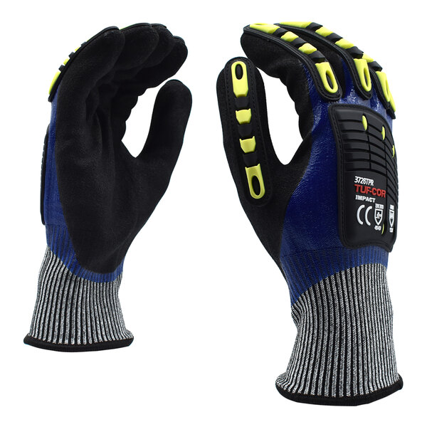 A close-up of blue and yellow Cordova warehouse gloves with black and yellow accents.