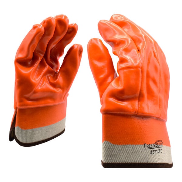 A close-up of a single orange Cordova PVC glove with white and grey trim.