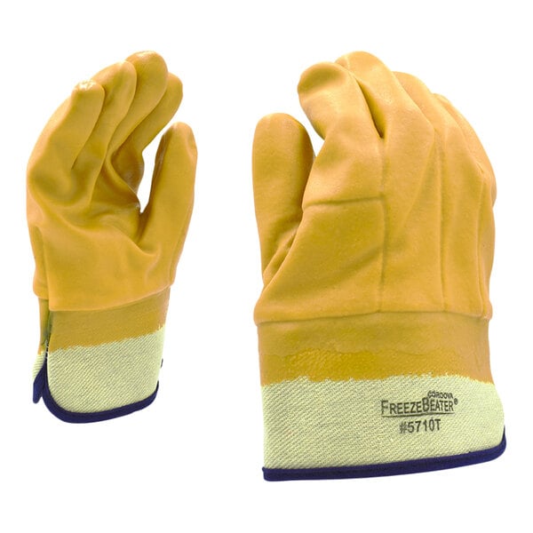 A pair of yellow Cordova PVC gloves with blue trim.