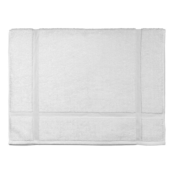 A white rectangular bath mat with a black grid border.