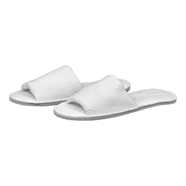 A pair of white Garnier-Thiebaut velour cotton slippers.