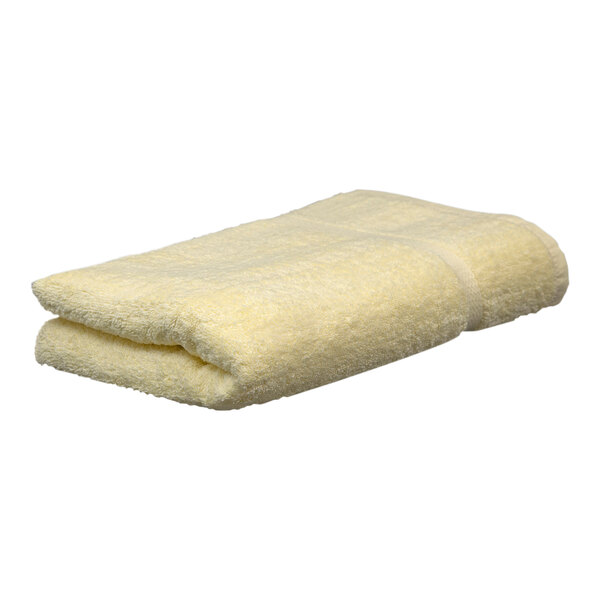 A yellow Garnier-Thiebaut pool towel with white accents.