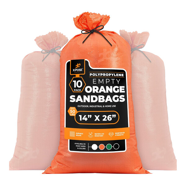 A plastic bag containing 10 orange Xpose Safety woven polypropylene sandbags with white and black text.