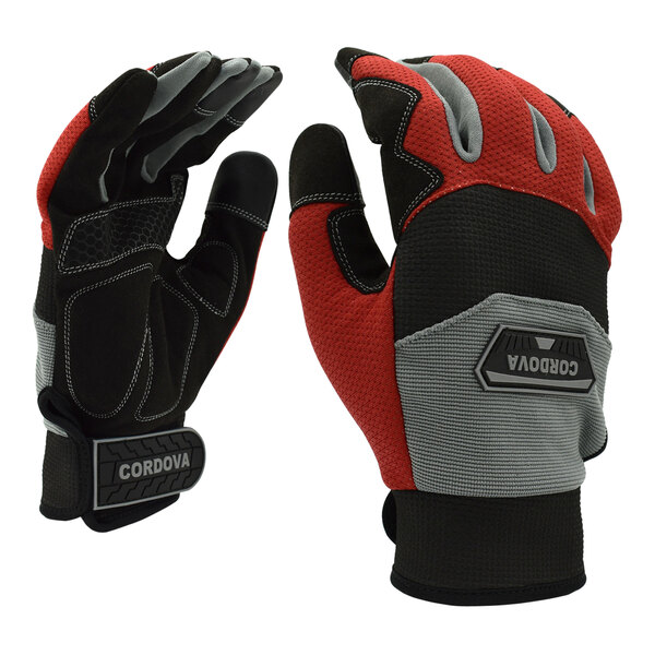 A pair of large Cordova touchscreen gloves with red and gray accents.