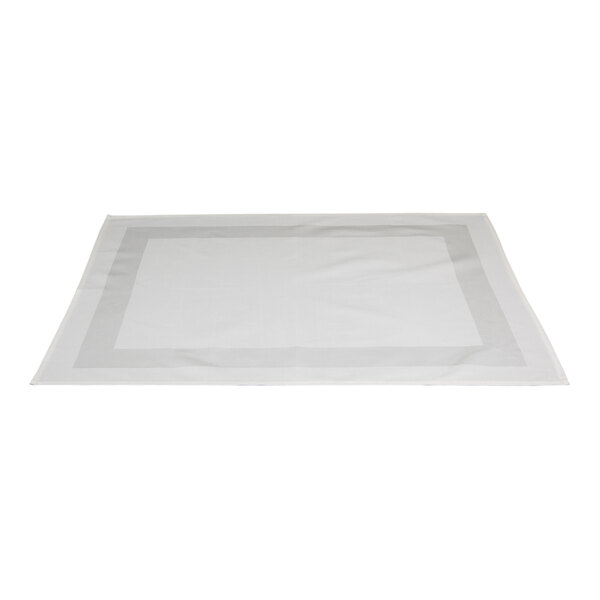 A white rectangular bedside mat with a small white border.