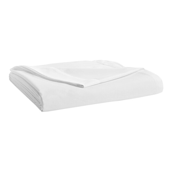 A white folded Garnier-Thiebaut Danville percale flat sheet.