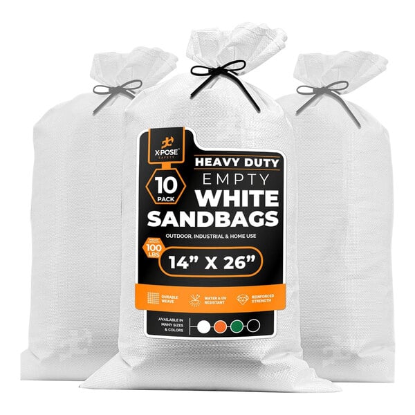 A group of white Xpose Safety woven polypropylene sandbags with black and orange labels.