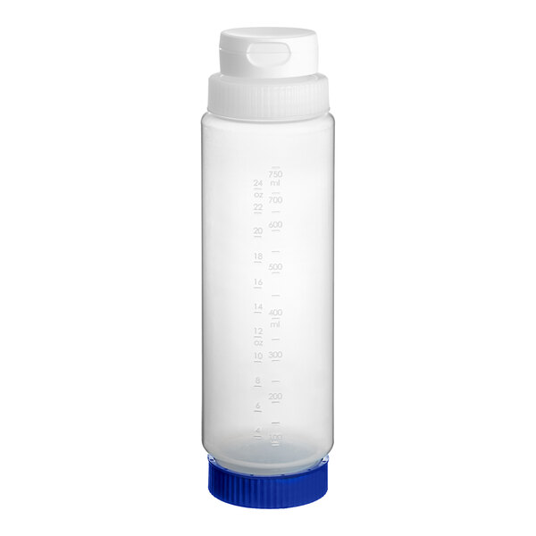 A Vollrath Traex clear plastic squeeze bottle with blue and white caps.