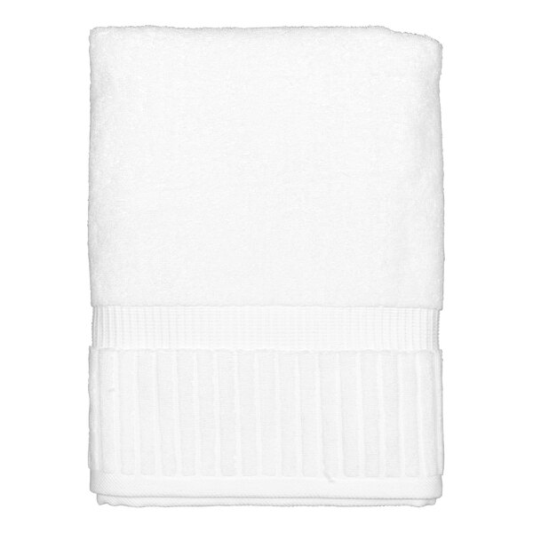 A white Garnier-Thiebaut bath towel with a white band.