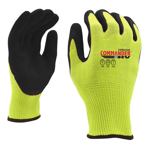 A pair of Cordova Commander heavy duty work gloves with yellow and black fabric and a sandy black nitrile palm coating.