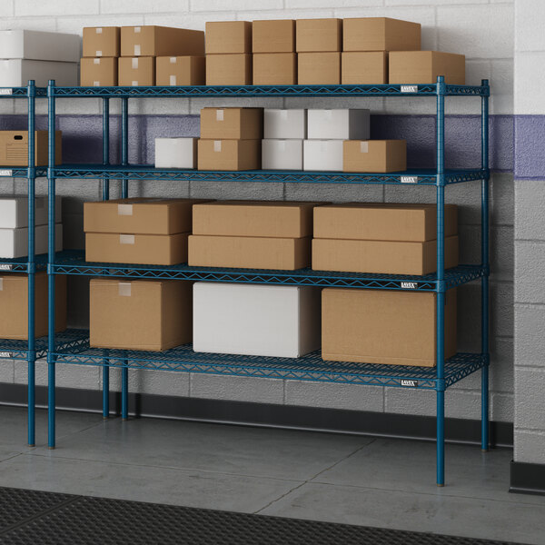 A blue metal Lavex Pro wire shelving unit with boxes on each shelf.