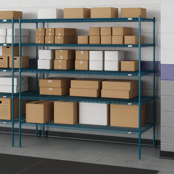 A blue metal Lavex Pro wire shelving unit with boxes on shelves.