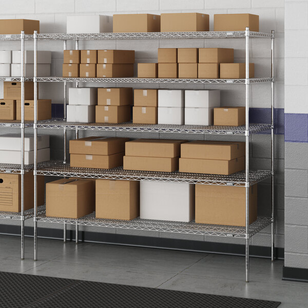 A Lavex Pro metal wire shelving unit with boxes on the shelves.