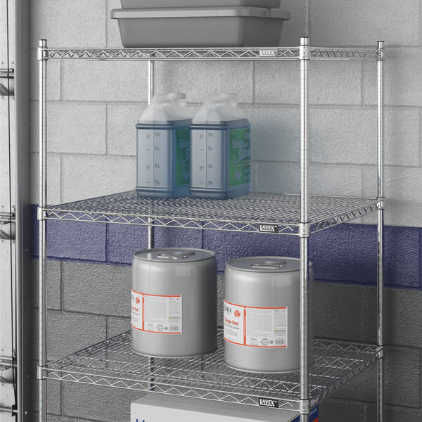 A Lavex Pro heavy-duty wire shelf with containers on it.