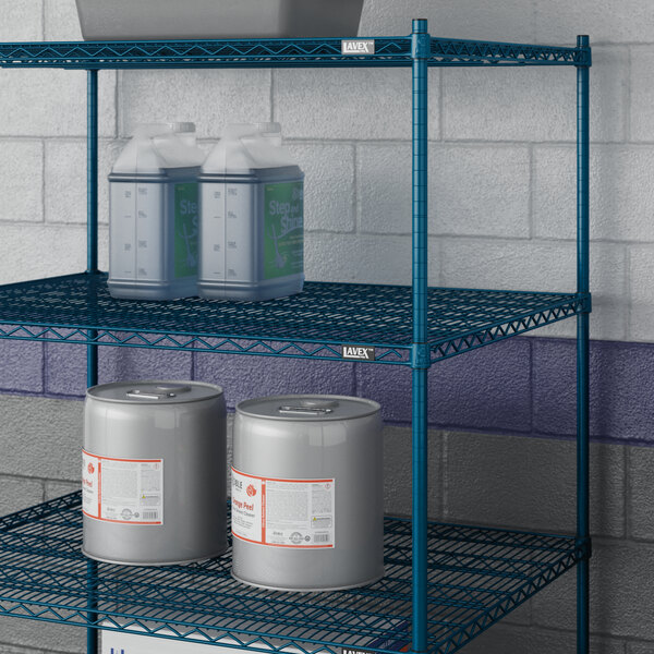 A Lavex Pro blue metal wire shelf with containers and cans on it.