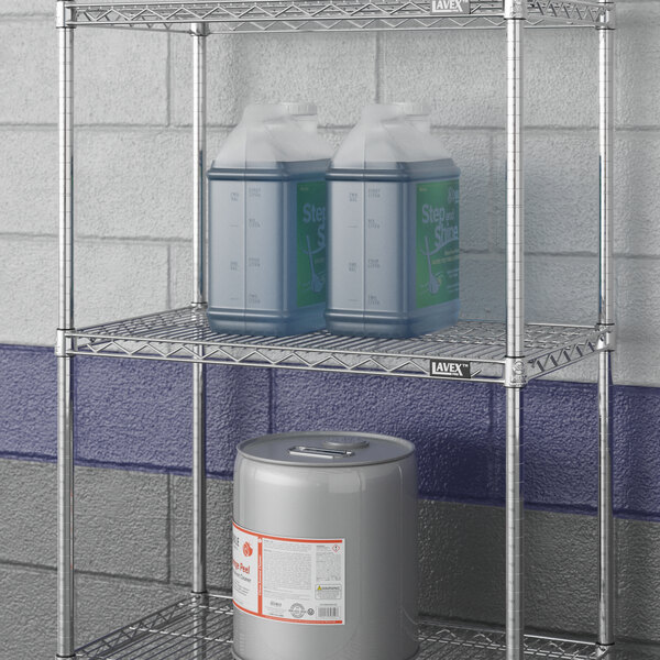 A Lavex Pro chrome metal shelf with containers on it.