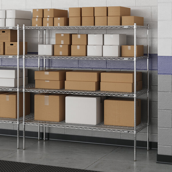 A Lavex Pro chrome wire shelving unit with metal shelves holding boxes.