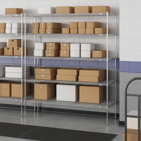 A white wire shelving unit with five shelves holding boxes.