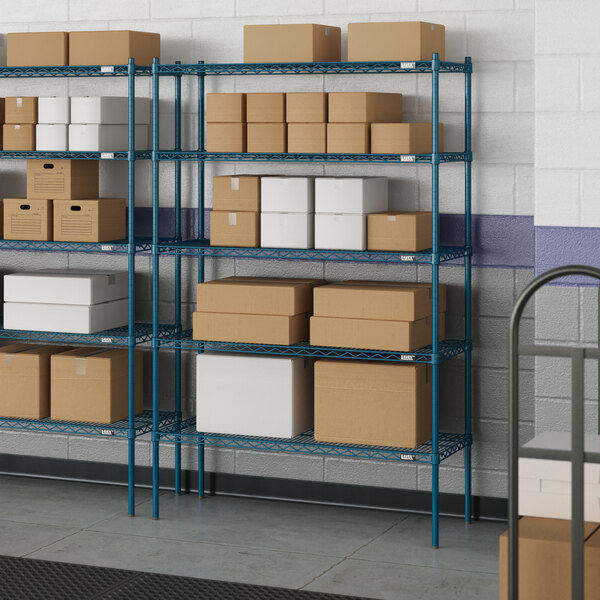 Blue metal Lavex Pro wire shelving with boxes on the shelves.