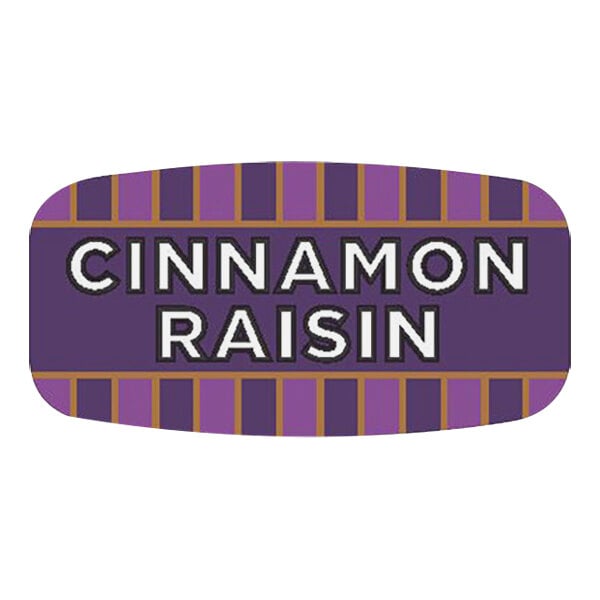 A purple rectangular bakery label with white text that says "Cinnamon Raisin"
