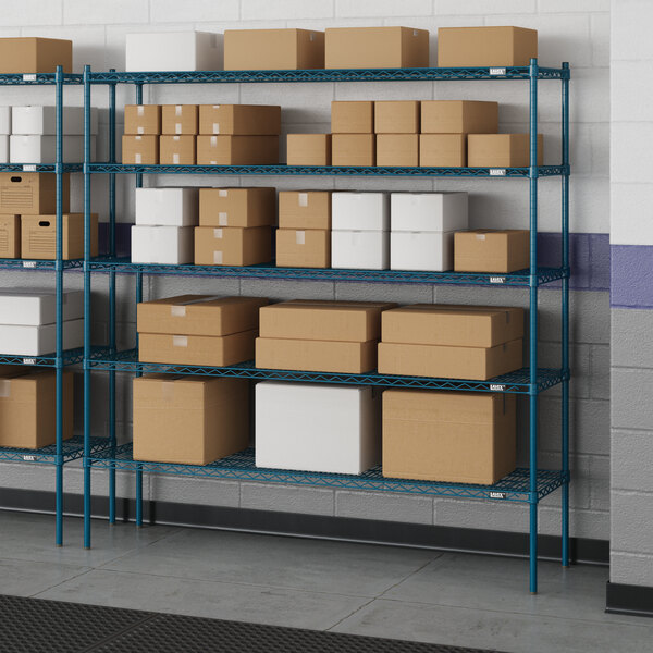 A blue Lavex Pro wire shelving unit with boxes on the shelves.