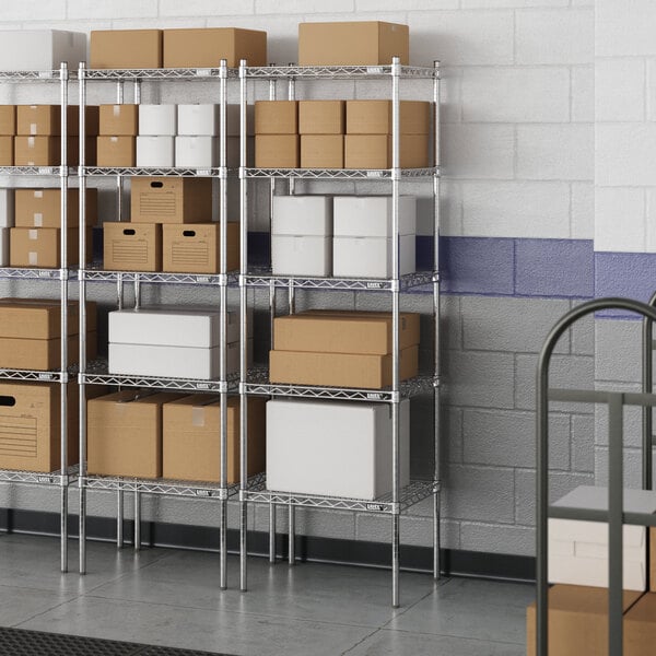 A wire shelf unit with rectangular shelves holding boxes.