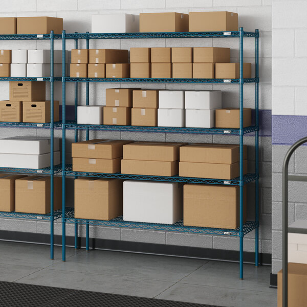 Blue Lavex Pro wire shelving in a warehouse with boxes.