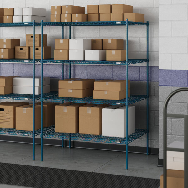 Blue metal wire shelving from Lavex Pro with white shelves holding boxes.