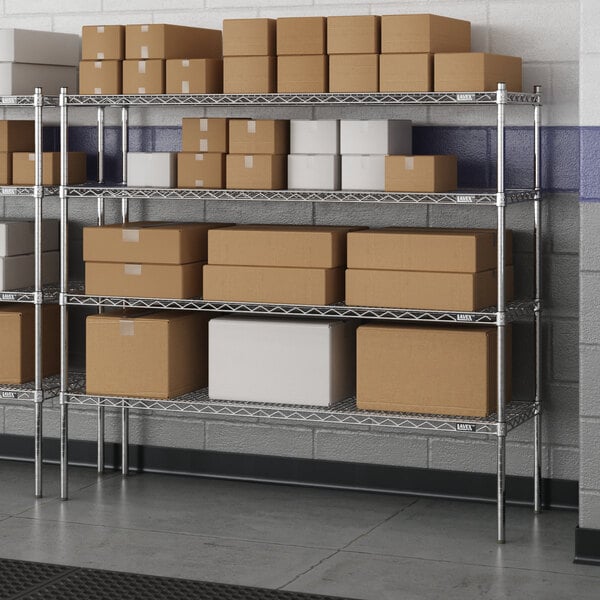 A Lavex Pro metal wire shelving unit with brown boxes on each shelf.