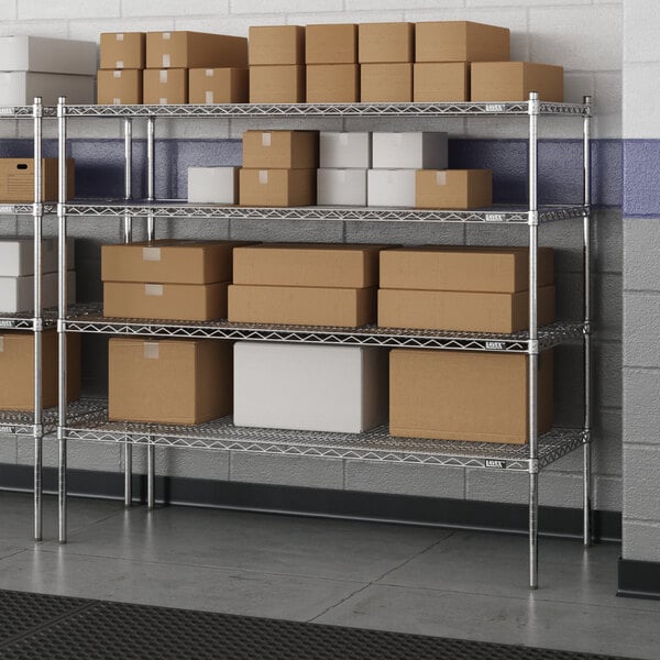 A metal Lavex Pro wire shelving unit with rectangular shelves holding boxes.