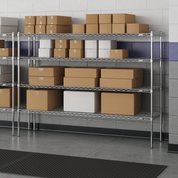 A Lavex Pro metal wire shelving unit with boxes on the shelves.