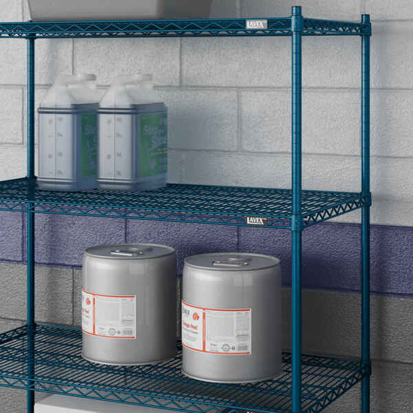 A metal Lavex Pro wire shelf with containers on it.