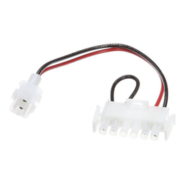 A white connector with a white and black wire and a red wire.
