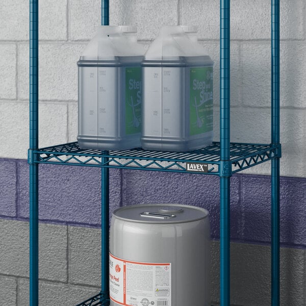 A blue metal Lavex Pro wire shelving unit with containers on it.