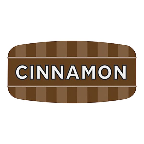 A white rectangular label with a brown border and white lettering that says "Cinnamon"
