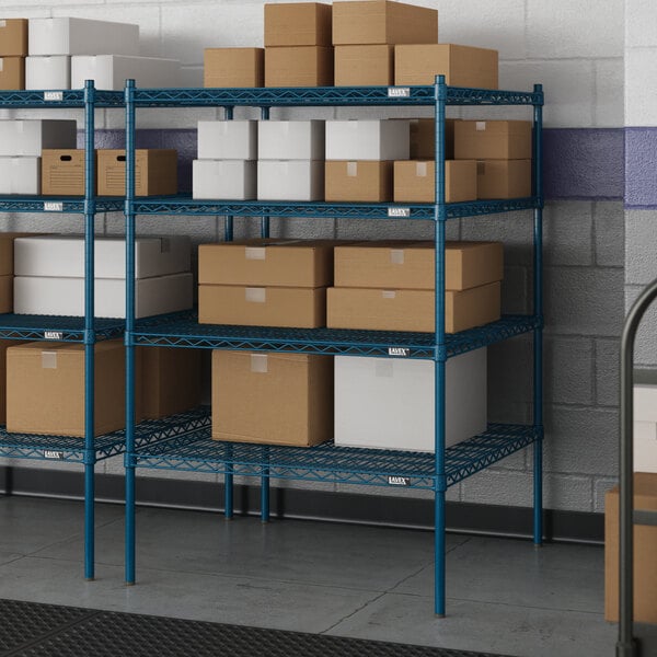 Blue metal Lavex Pro wire shelving with white boxes on the shelves.