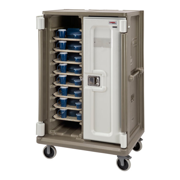 A white and gray Cambro meal delivery cart with trays inside.