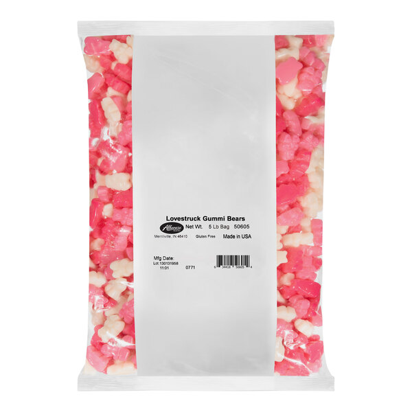 A bag of Albanese Lovestruck gummi bears with pink and white candy inside.