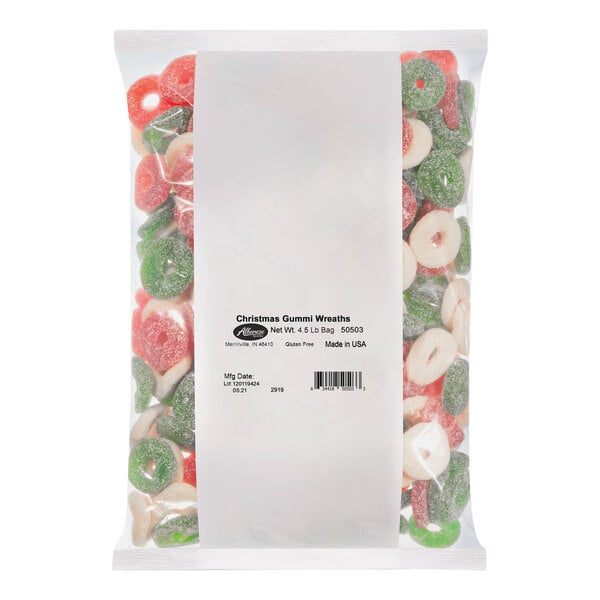A white package of green Albanese Christmas gummi wreaths.