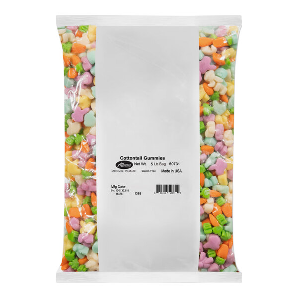 A close up of a bag of Albanese Cottontail Gummi Mix with colorful gummy candies inside.