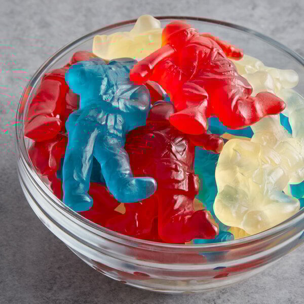 A bowl of Albanese Gummi Military Heroes on a table.