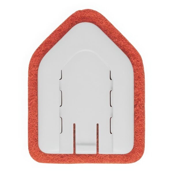 A white rectangular sponge refill with holes in it.