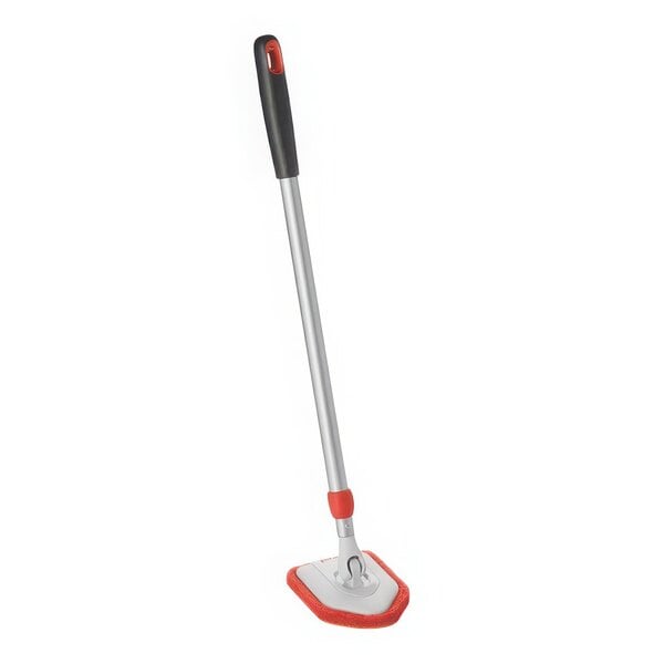 An OXO Good Grips Tub and Tile Scrubber with a red and black handle.
