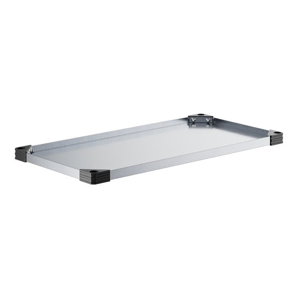 A Regency galvanized steel wall shelf.