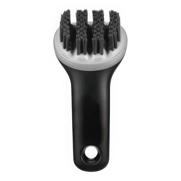 An OXO Good Grips black and white electric grill and panini press brush with black bristles.