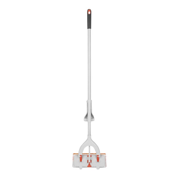 An OXO Good Grips white microfiber mop with orange handles.