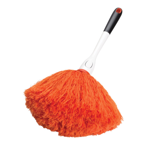 A microfiber delicate duster refill with an orange fluffy head and a white and black handle.